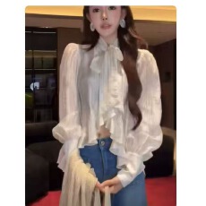 批发气质荷叶边蝴蝶结长袖衬衫女秋季新款高级感不规则宽松百搭短上衣